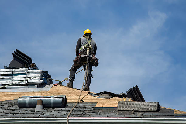 Professional Roof Replacement technician working in Nome, ND